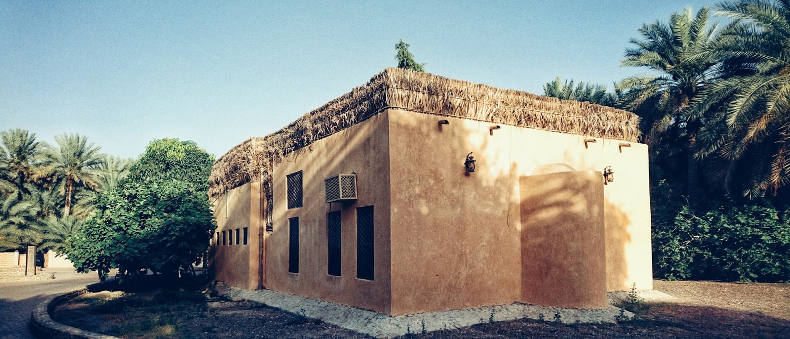 A mud-brick house among the palms of the Al Ain oasis