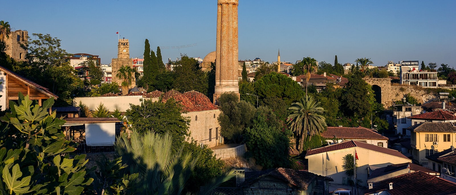 The rooftops of central Antalya with the fluted Yivli Minare
