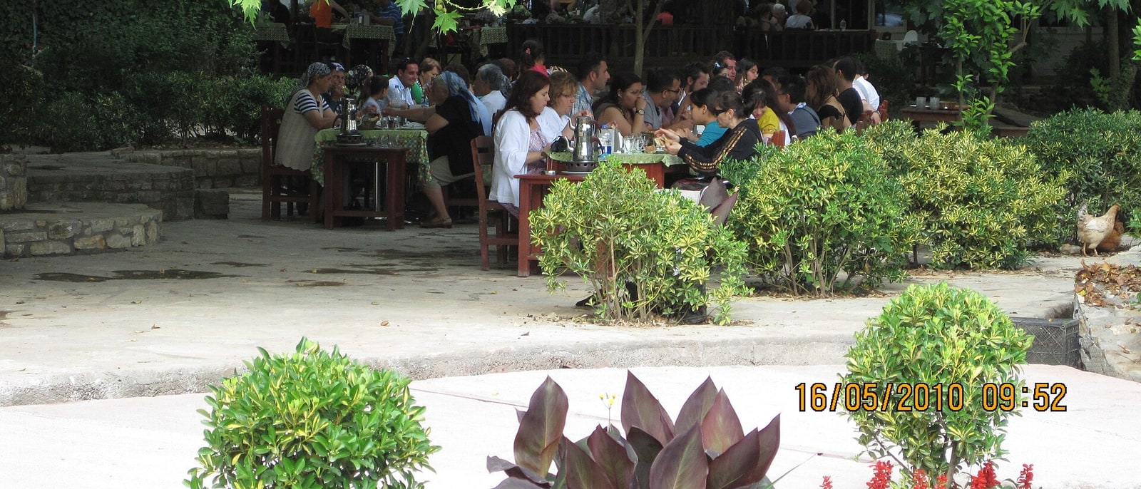 Outdoor restaurant tables in Antalya, laid for breakfast