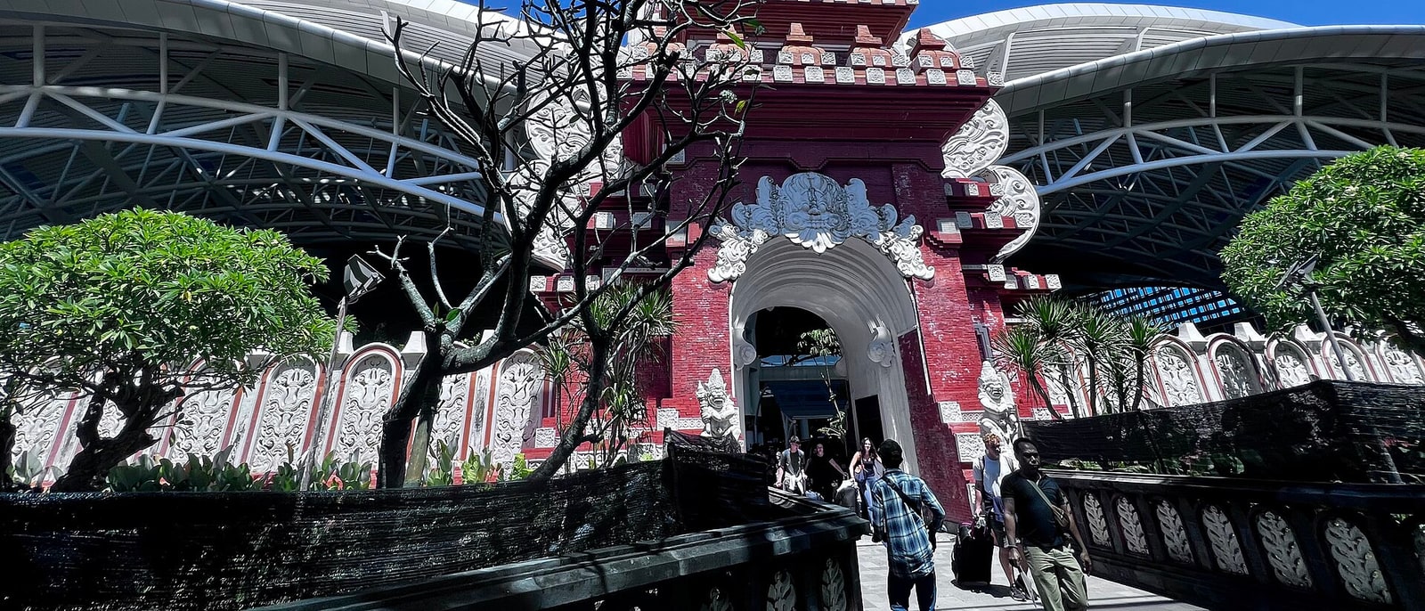 The carved Balinese gate at the entrance to Ngurah Rai airport