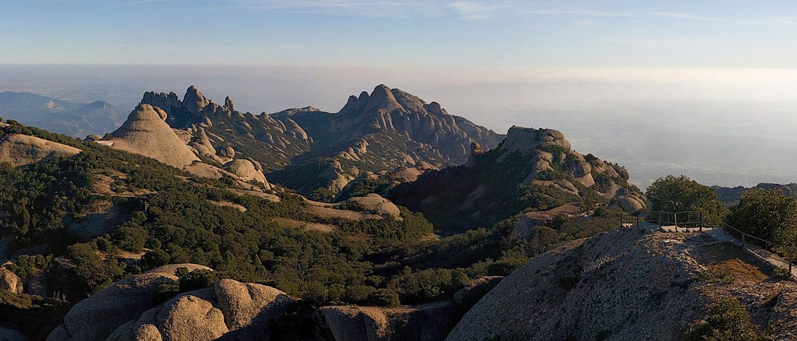 The rock spires of Montserrat cut against the horizon