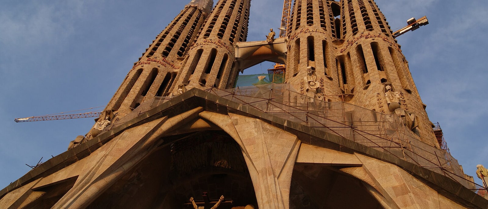 The towers of the Sagrada Família with the site cranes: a century and counting