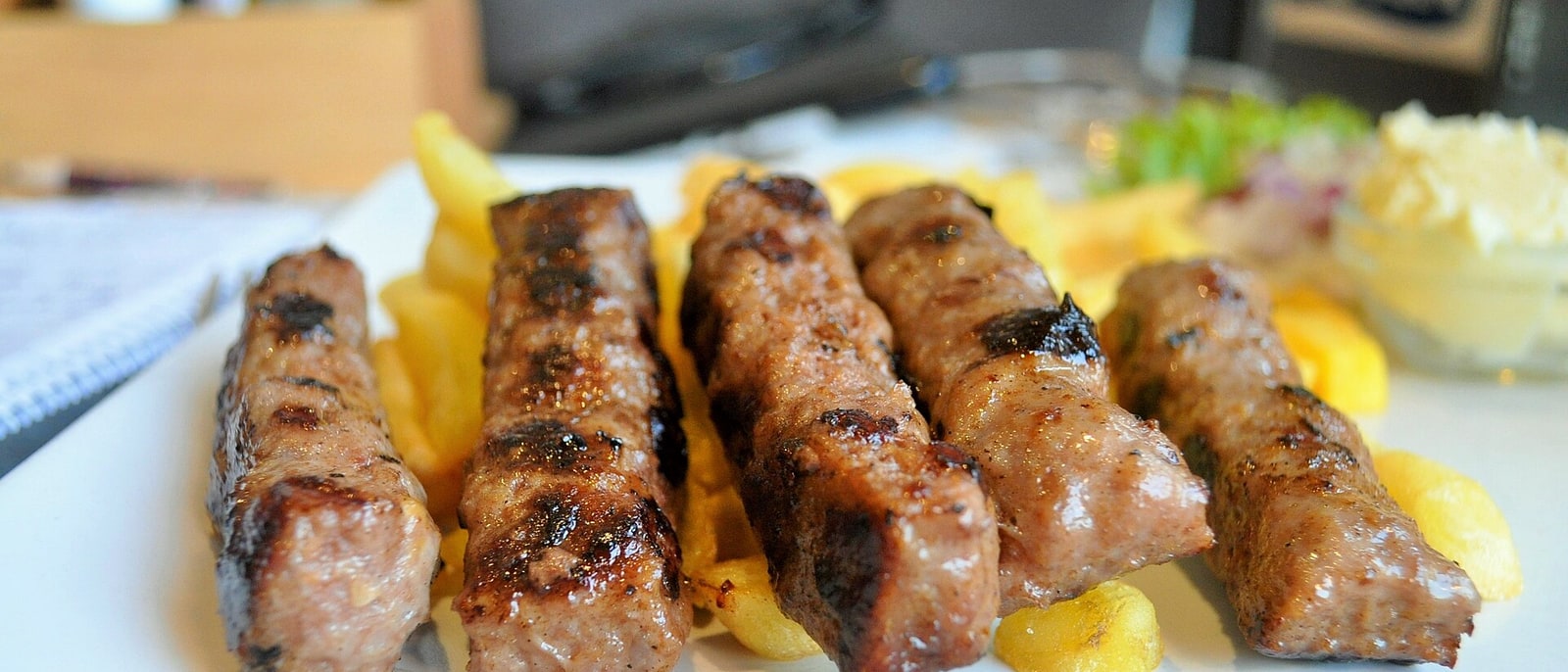 A plate of ćevapi straight off the grill