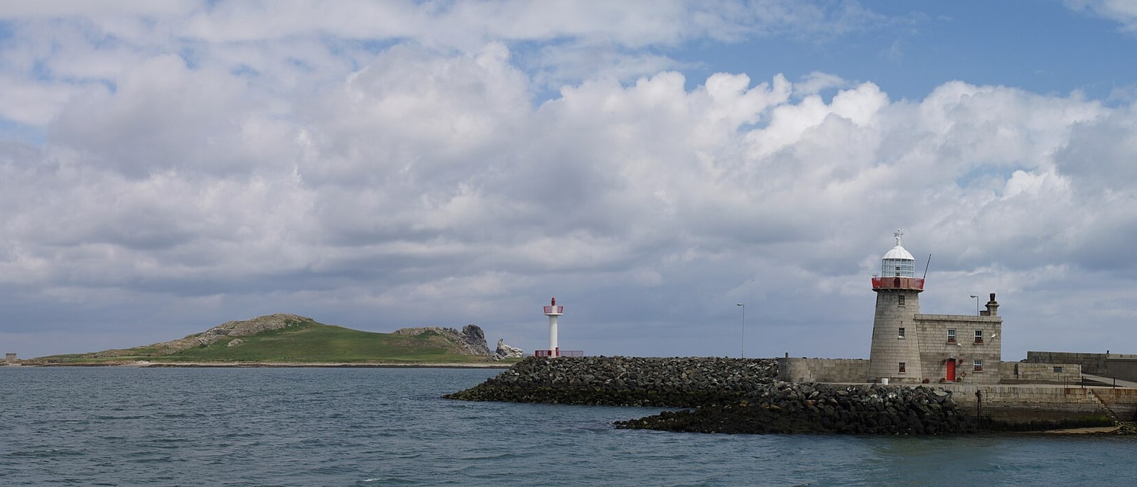 The Howth lighthouse on its pier, with Ireland’s Eye behind