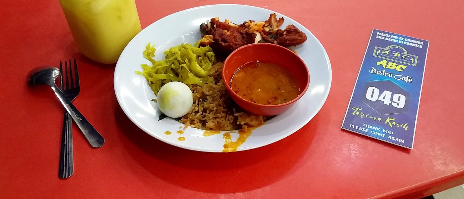 Banana leaf rice served in Brickfields, with the table number