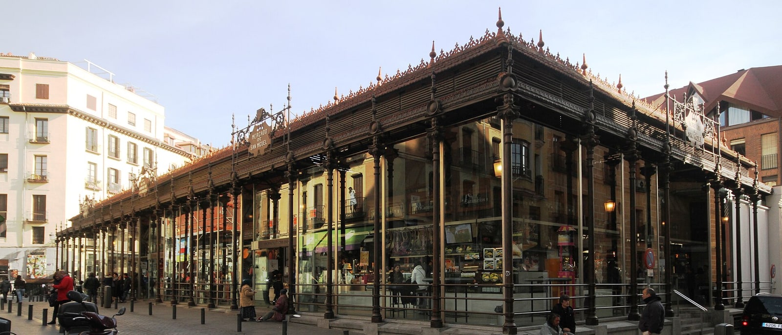 The iron-and-glass shell of the Mercado de San Miguel from the street