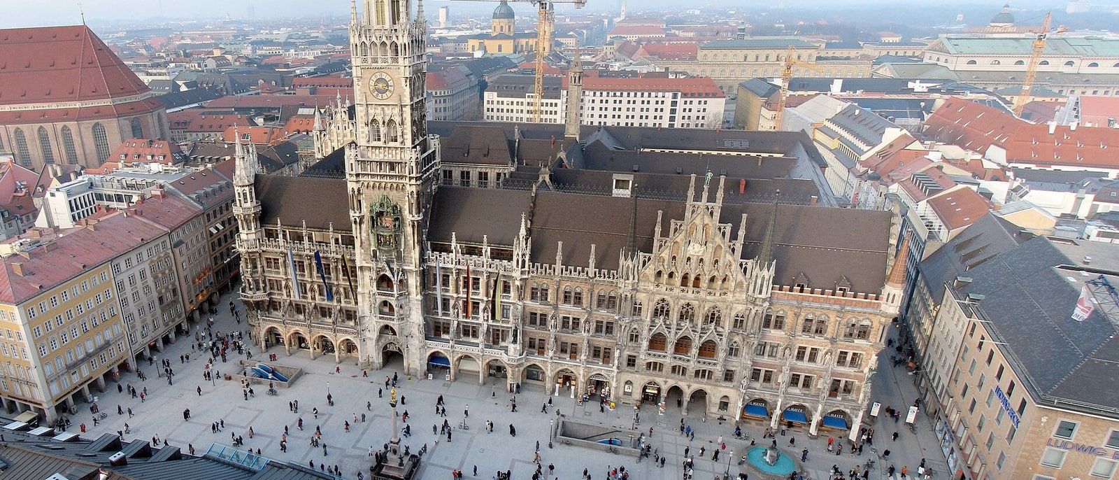 The neo-Gothic Neues Rathaus and Marienplatz from above, the city spreading behind