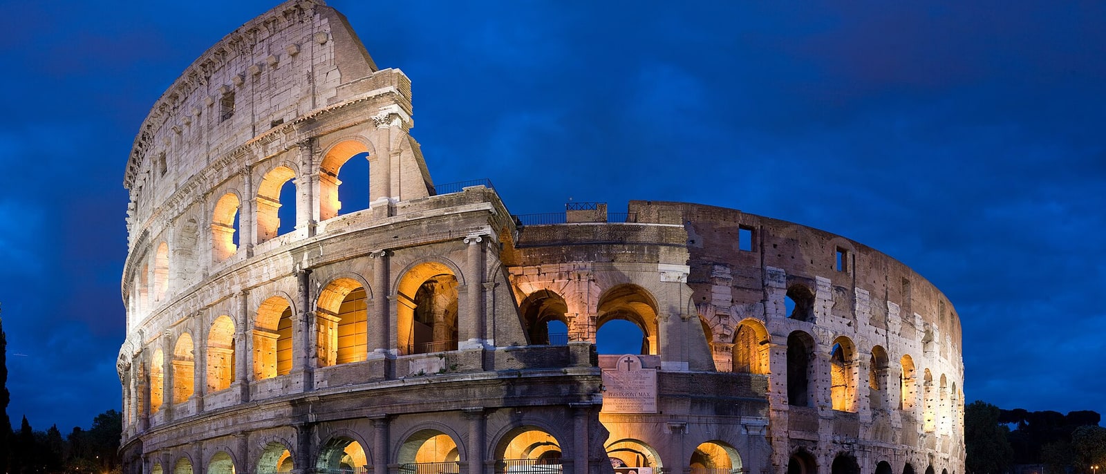 The Colosseum at dusk: the side that collapsed and the side still standing