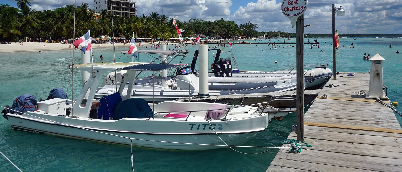 Boats moored in the still water at Boca Chica, the closest beach to the capital