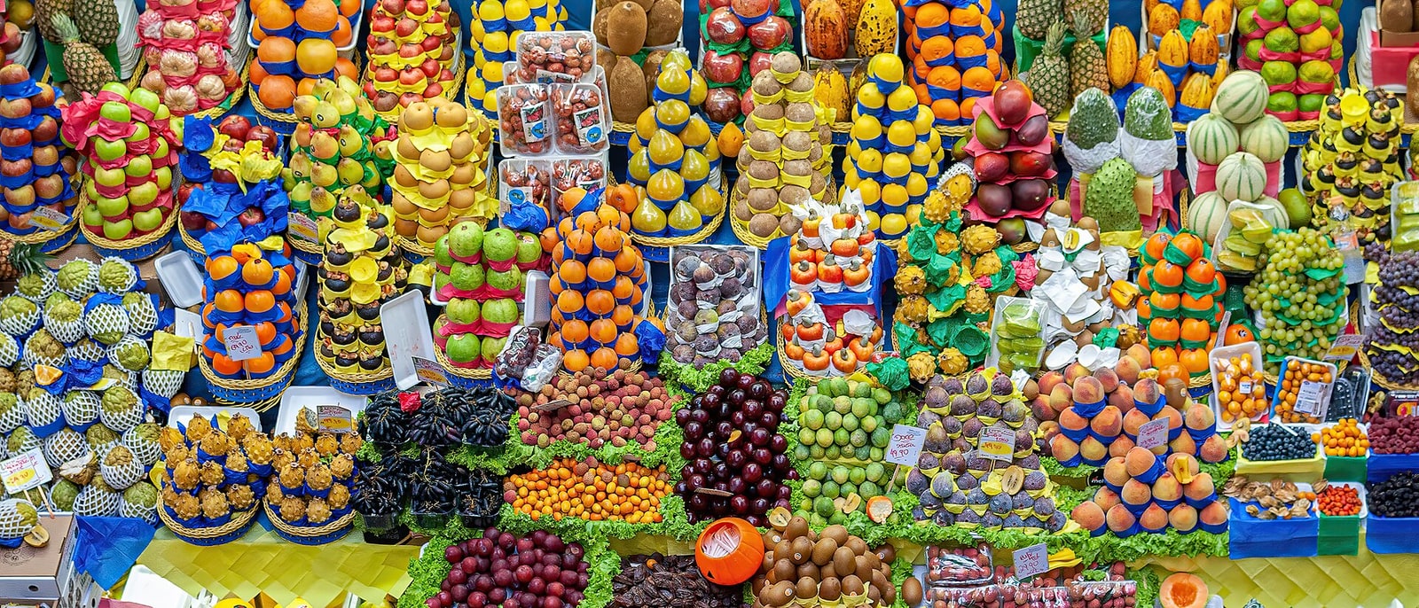 A fruit stall at the Mercadão, stacked to the top