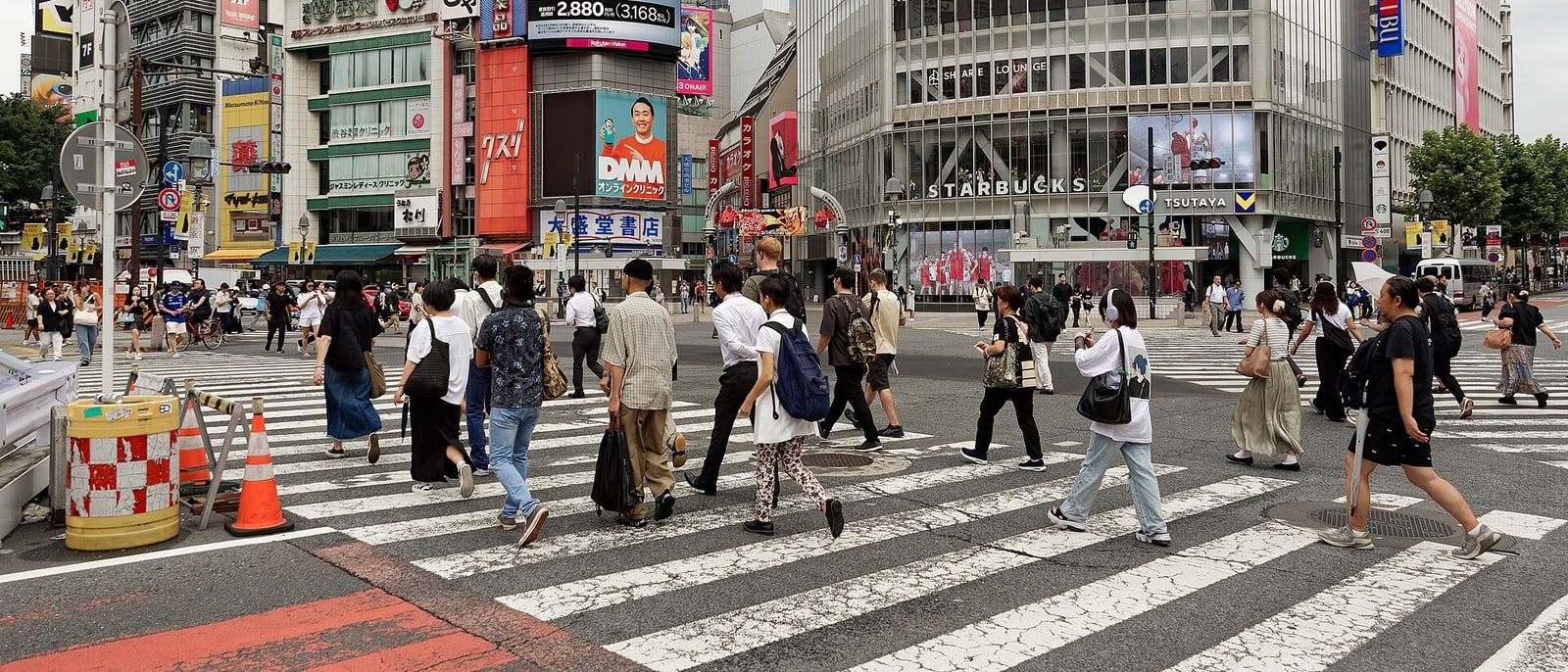 Shibuya crossing mid-surge of pedestrians
