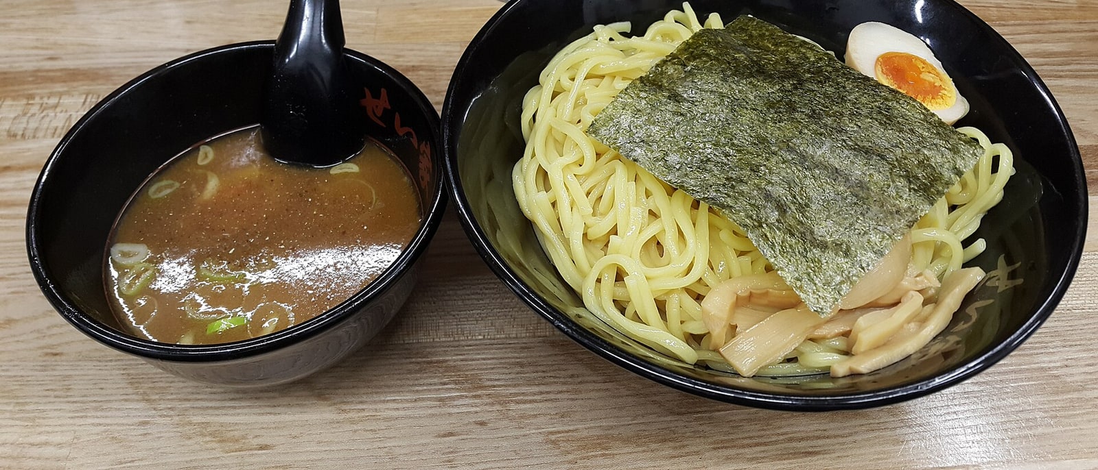 Tsukemen: noodles on one side, thick dipping broth on the other, with nori and egg